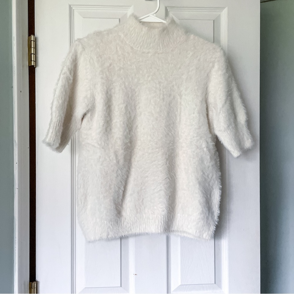 Marled half-sleeve mock neck fuzzy sweater